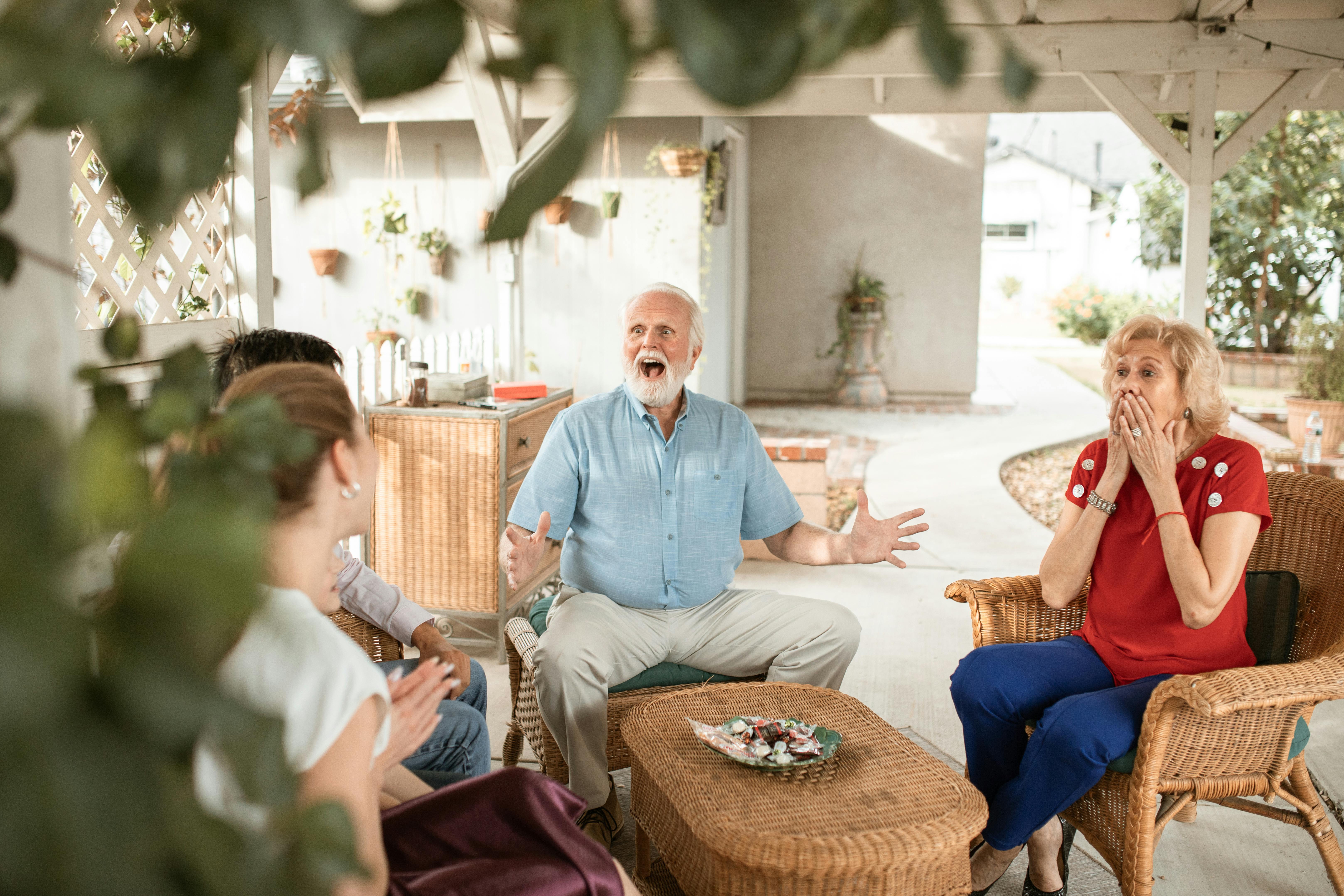 Residents sharing a laugh on the patio